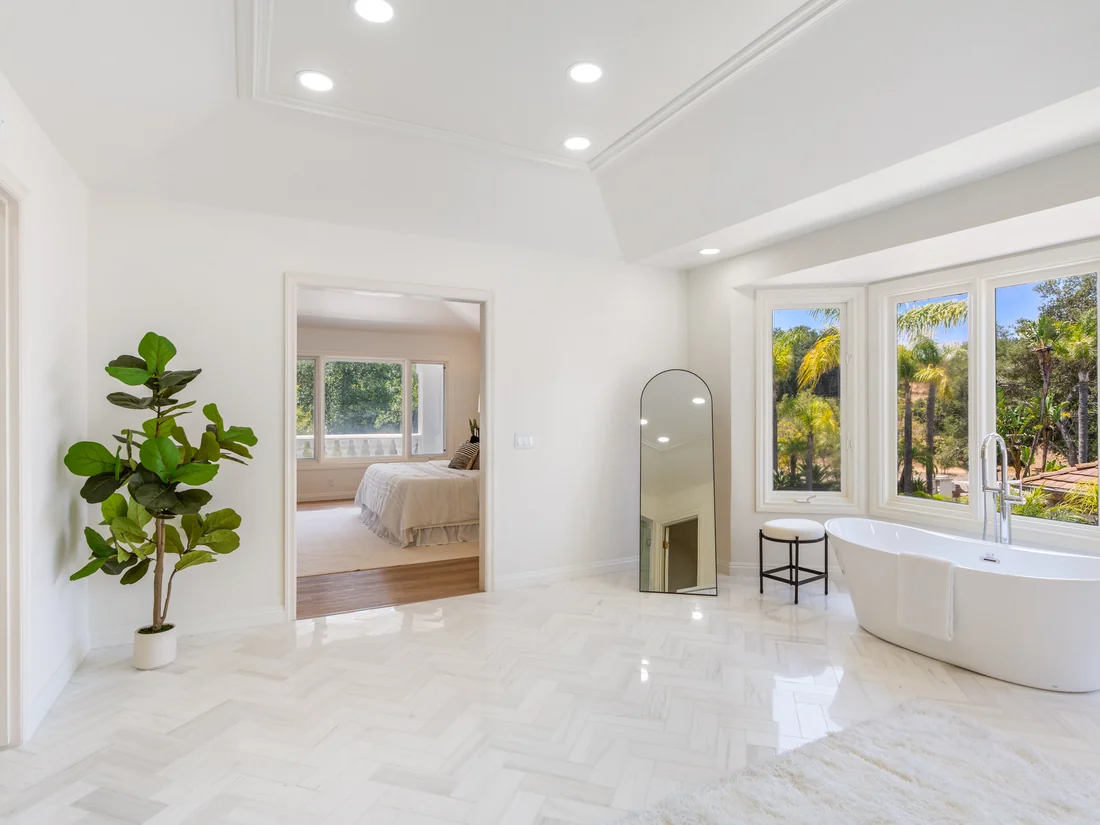Pre-sale bathroom remodel — primary bath opening to bedroom suite, prepared for listing in Coto de Caza